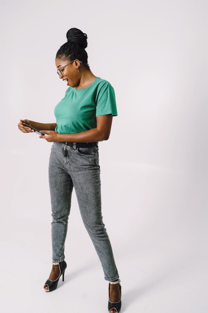 Woman Reading a Message on a Smartphone